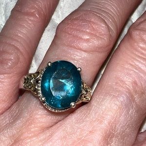 Blue Topaz or Aquamarine center oval stone sterling silver w/ gold overlay